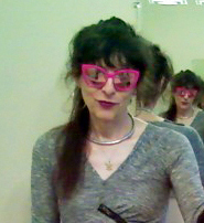 authorphoto3pinkglasses