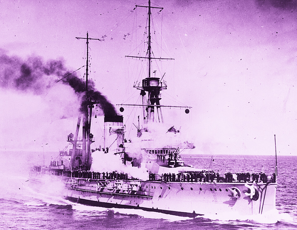 Archival black and white photo of the Spanish battleship España rendered in purple.